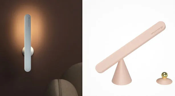 White geometric table lamp with touch switch and USB cable on a wooden desk.