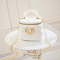 Transparent PVC bucket bag with a heart pattern, shown in one of seven available colours.