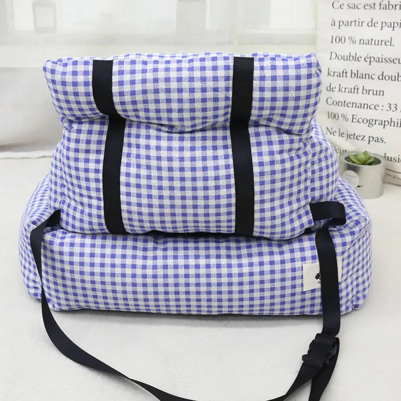 Blue plaid and grey cloth car-mounted pet travel nests shown in small and large sizes