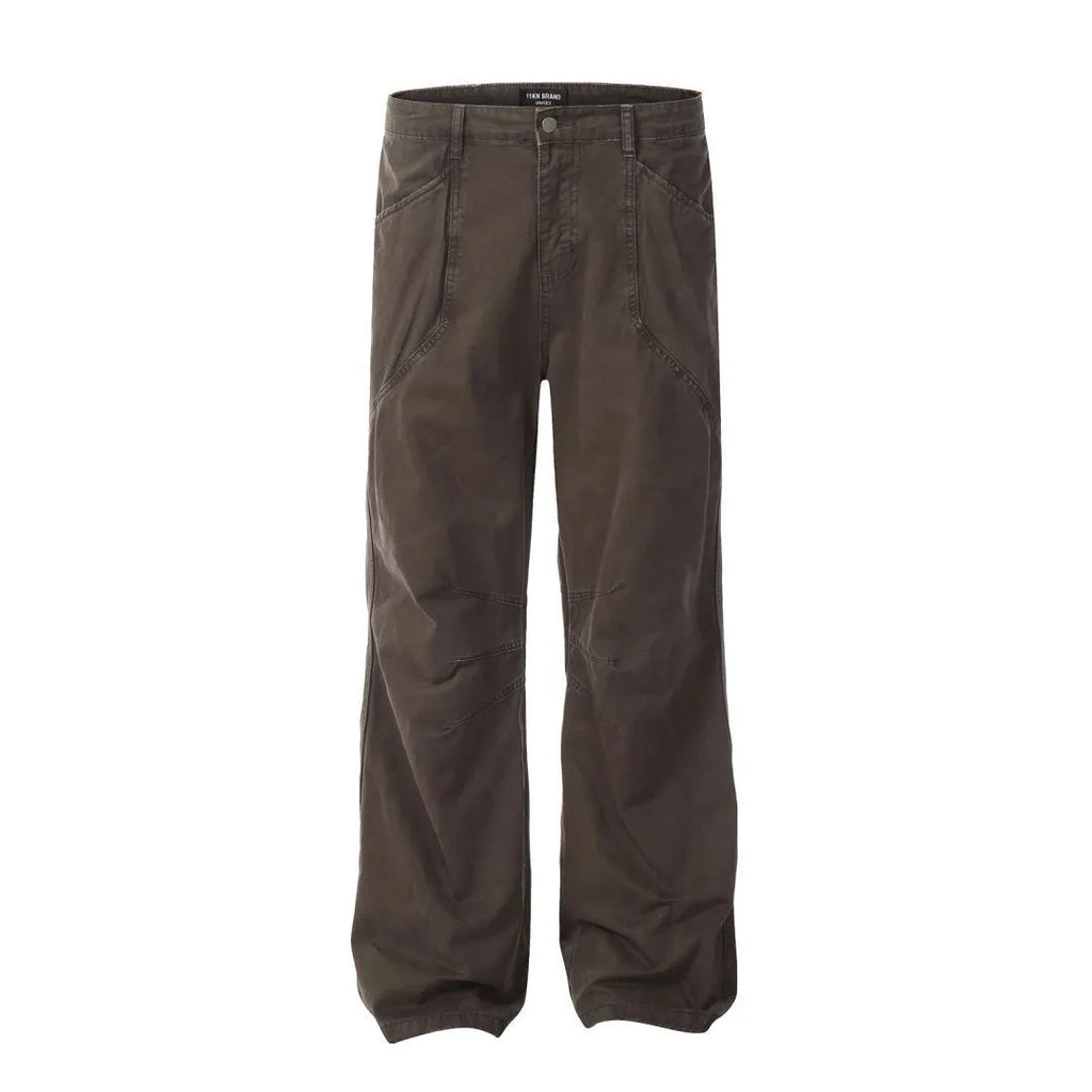 Men's brown loose straight leg high waist cotton trousers laid flat.