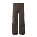 Men's brown loose straight leg high waist cotton trousers laid flat.