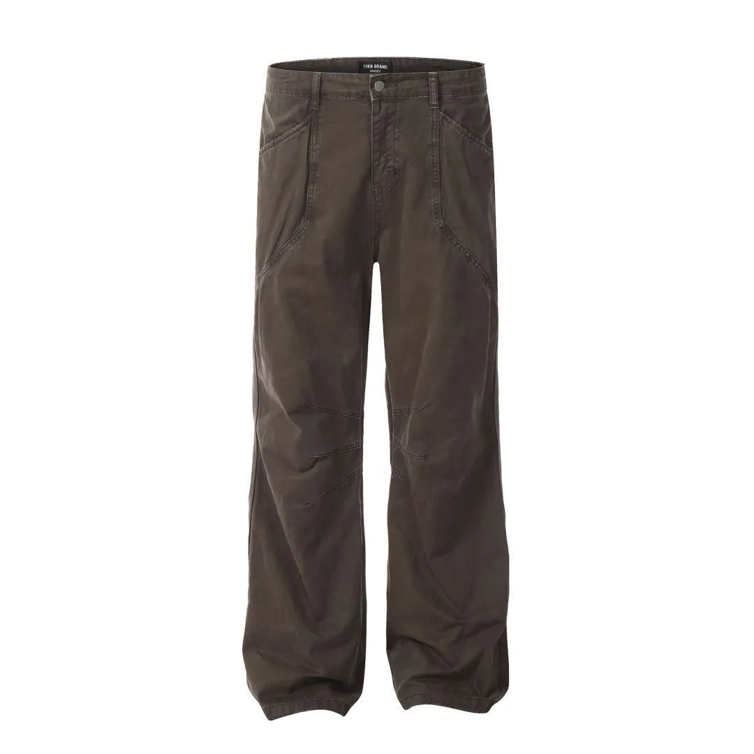 Men's brown loose straight leg high waist cotton trousers laid flat.