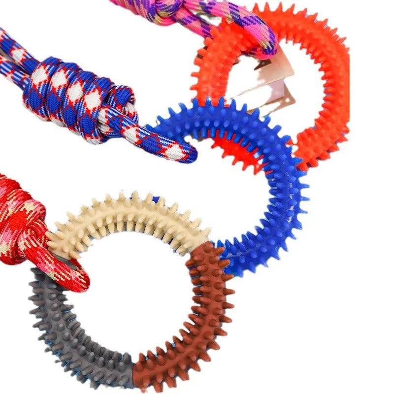 Colourful blue, red, and rose red braided rope dog chew and tug toy, 43 cm long.
