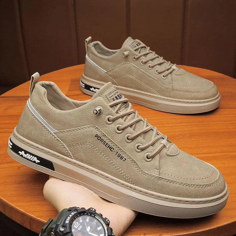 Men's waterproof casual work shoes with rubber soles in black, gray, and khaki colour options