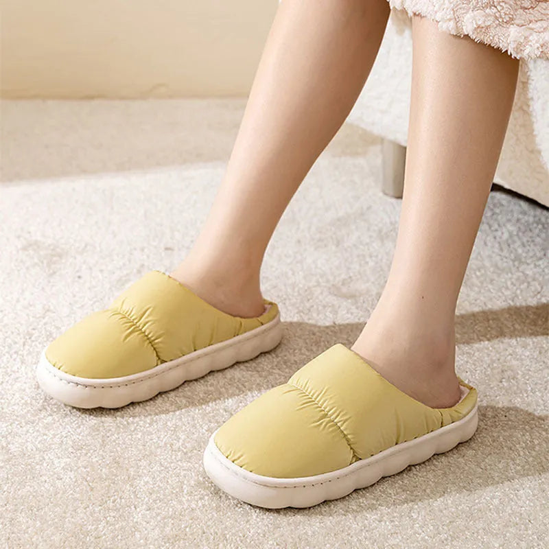 Down cotton couple slippers with artificial leather upper and non-slip rubber soles in multiple colour options