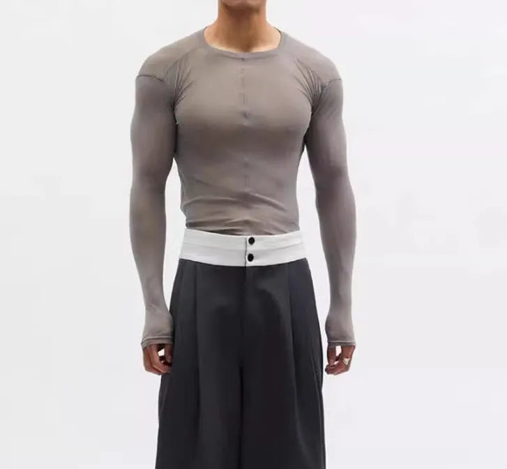 Black slim-fit women's pullover top with see-through mesh texture and long sleeves.