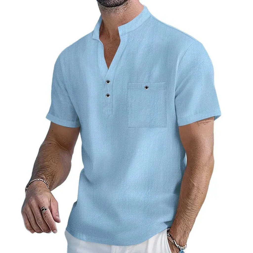 Men's light blue stand collar linen short sleeve T-shirt laid flat, showing loose fit and solid colour.