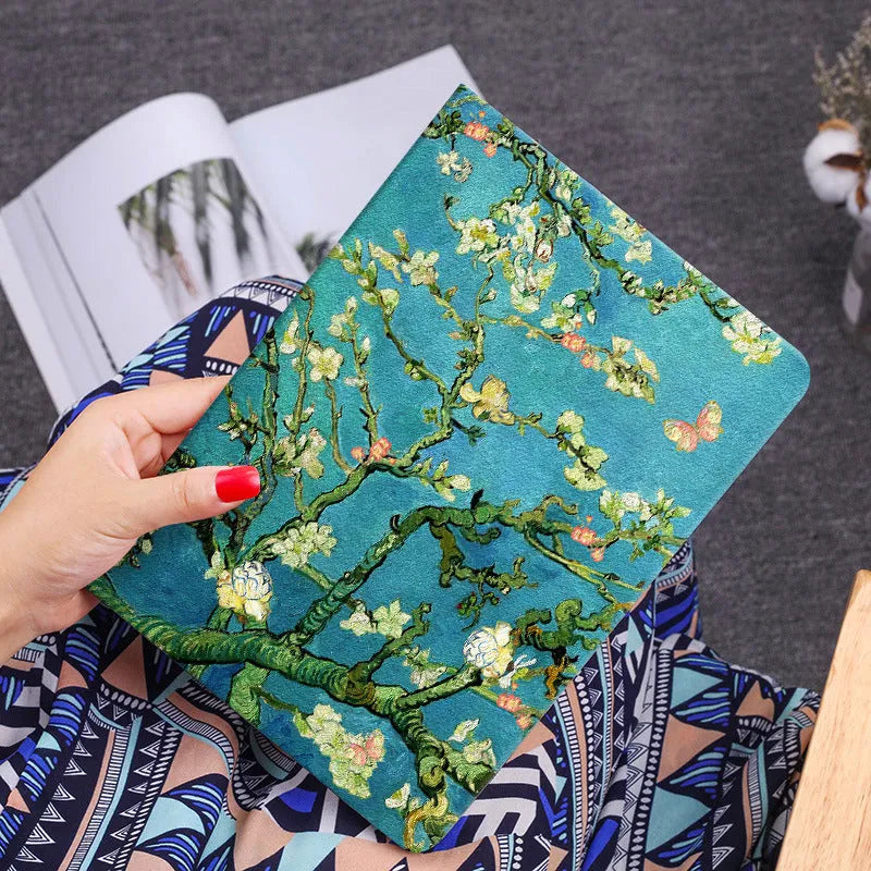 Handmade liquid silicone flip case for iPad featuring floral and oil painting designs.