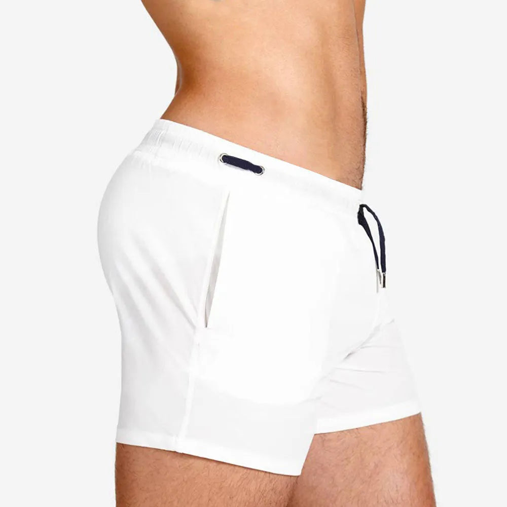 Mesh lining swimming sports shorts in polyester fabric available in six solid colours