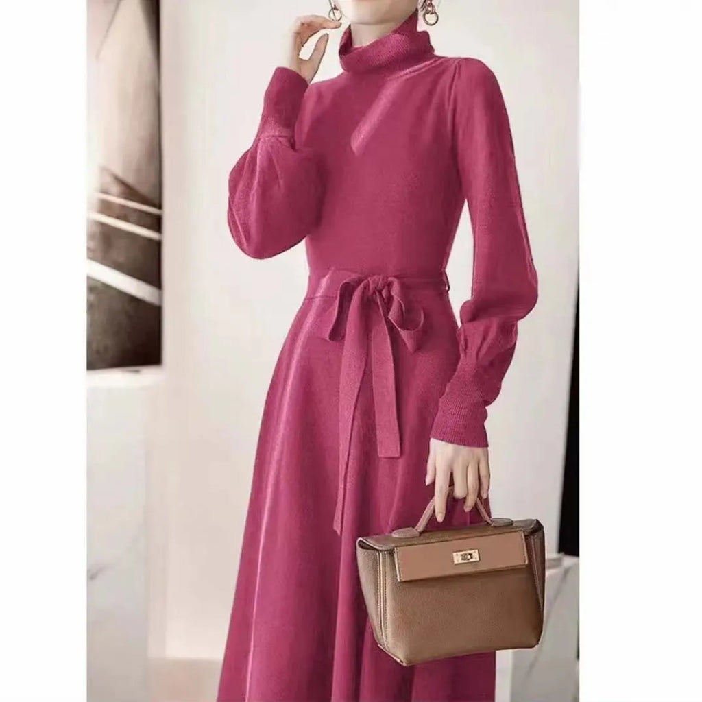 Turtleneck knitwear dress in polyester fabric with elastic waist and loose hem in solid colour