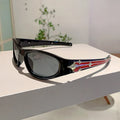 PC frame sports sunglasses with category 3 lenses in black frame blue lens colour option