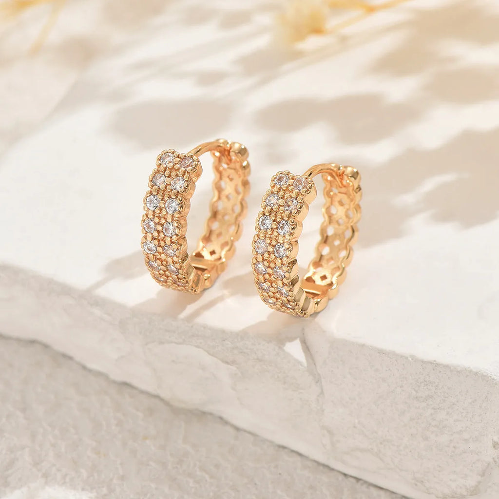 Geometric copper ear studs with round, dot, and ring elements in DE20288 colour