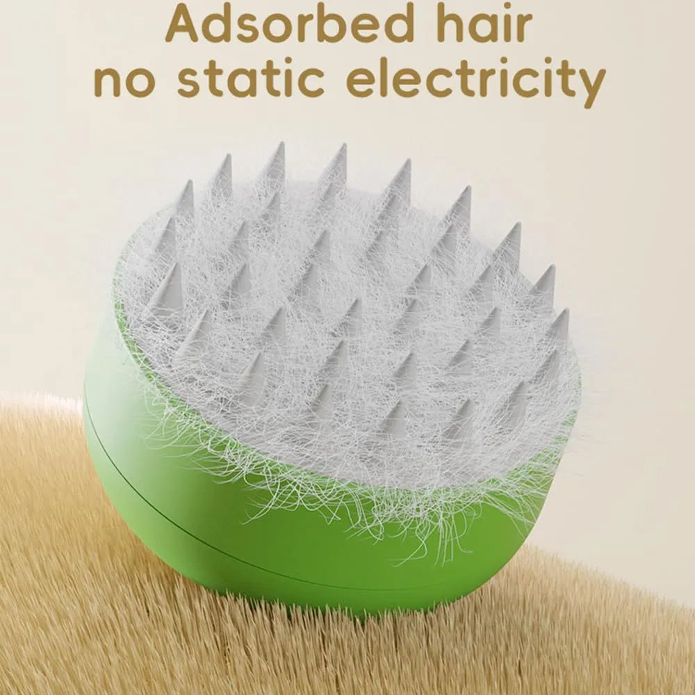 Rechargeable green and yellow silicone steam brush for grooming cats and dogs.