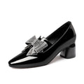 Rhinestone bow high heel women's shoes in black with pointed toe and microfiber upper