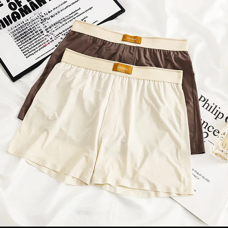 Men's loose-fit ice silk underwear in a solid colour on a mid-waist.