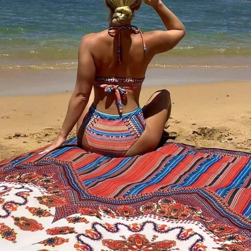 Women's three-piece split swimsuit set showing high-waist briefs and cutout blouse in polyester fabric