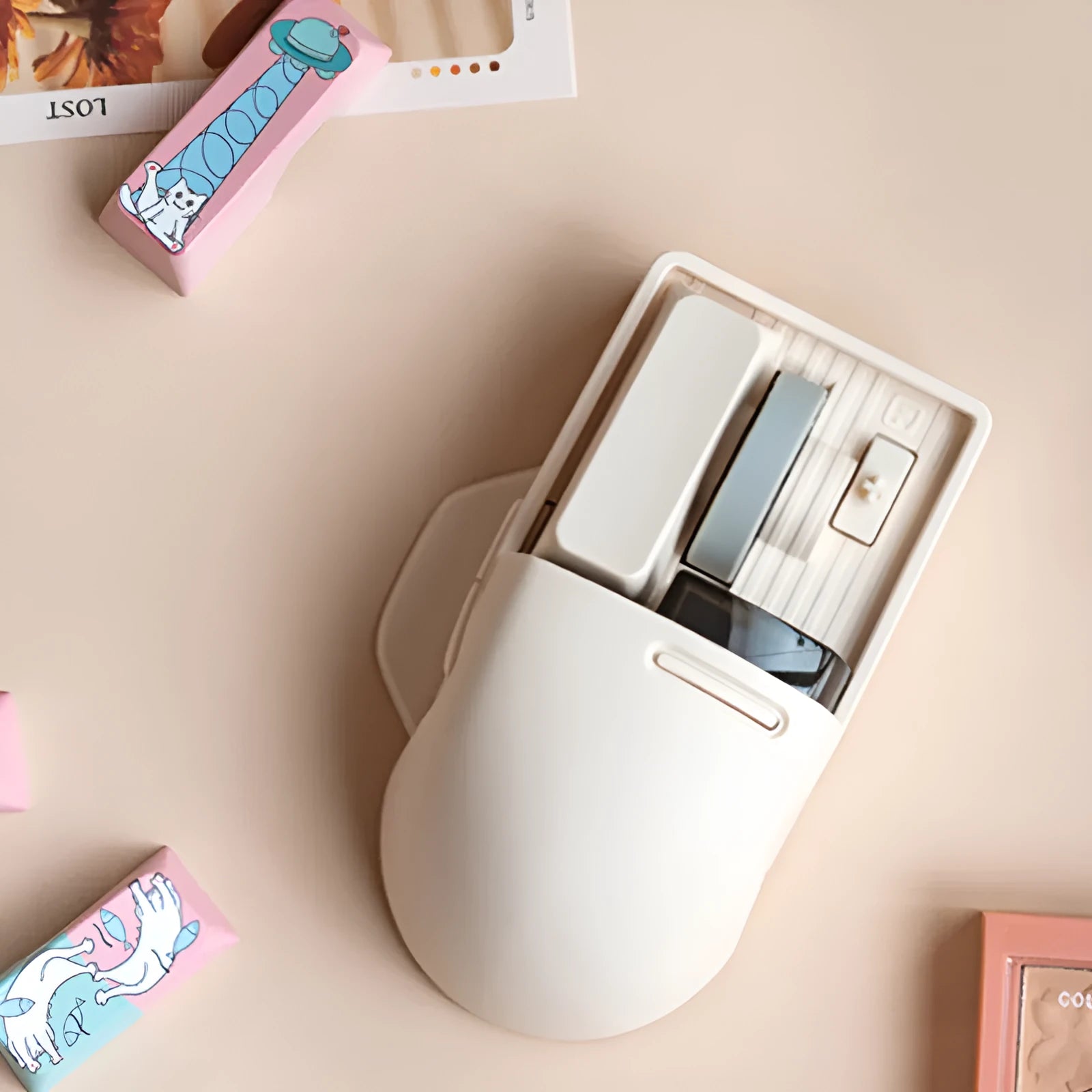 Xiaoqiao Three Mode Wireless Mouse in tofu colour showing seven buttons and four-way scroll wheel