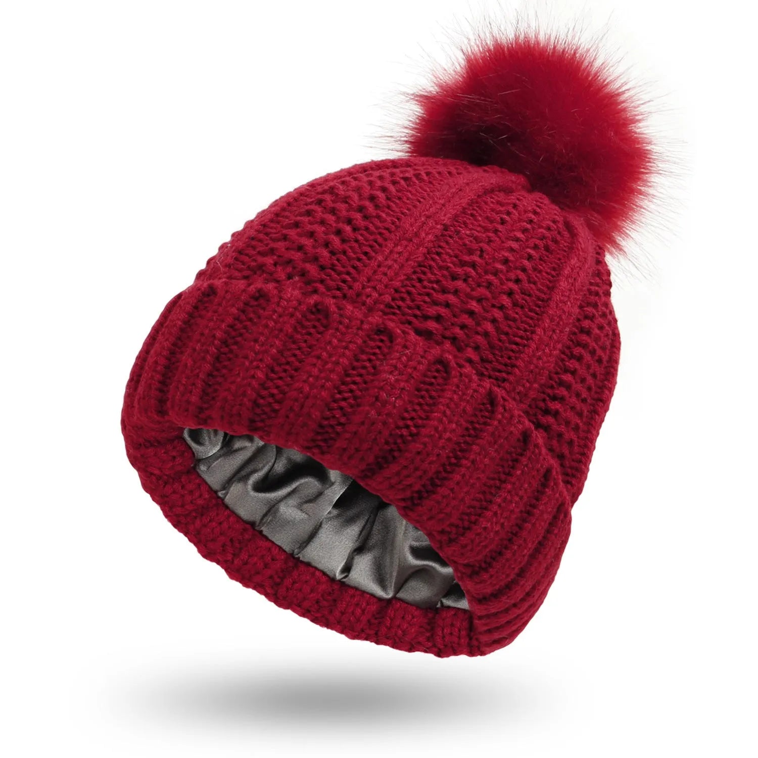 Women's satin lined wool beanie with faux fur pom pom in classic winter colours