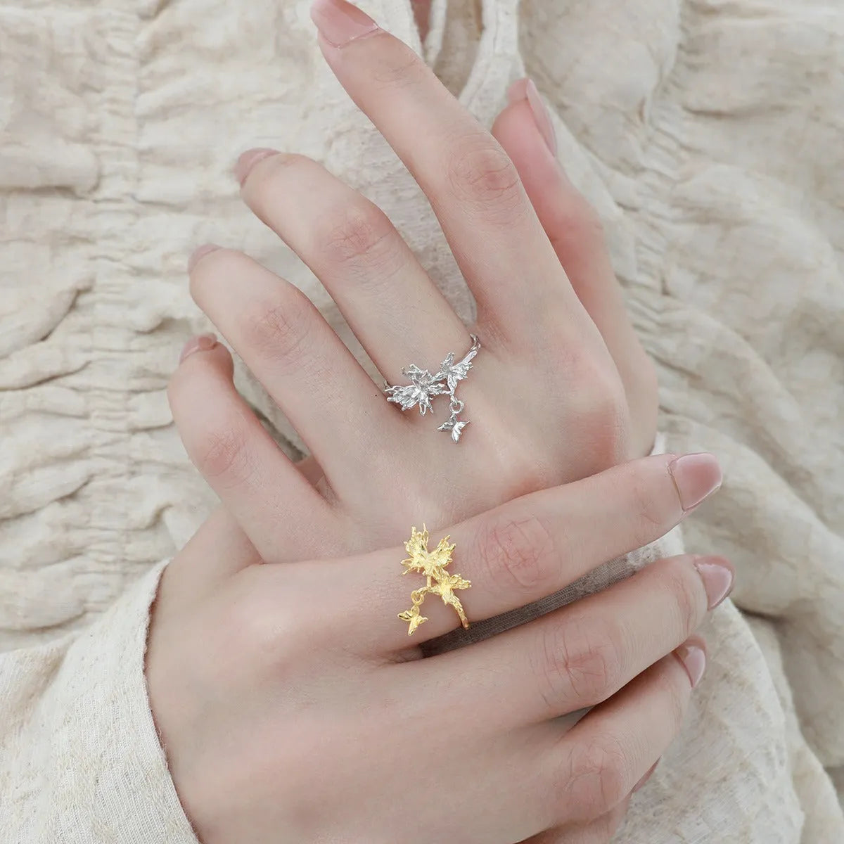 Adjustable silver ring with detailed butterfly design in white gold or 18K gold finish