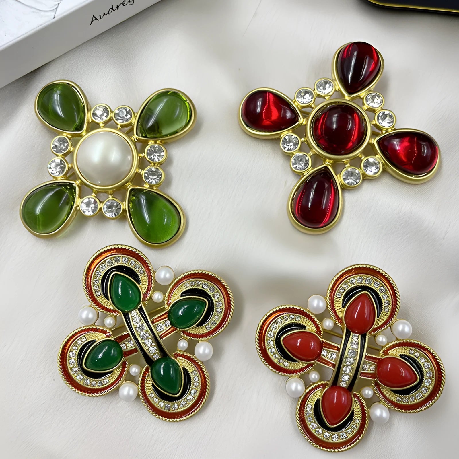 A vintage-style medieval baroque crystal brooch made from zinc alloy, shown in one of eight available colour options.