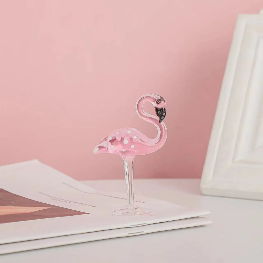 Pink crystal flamingo decorative ornament on tabletop with modern simplicity style