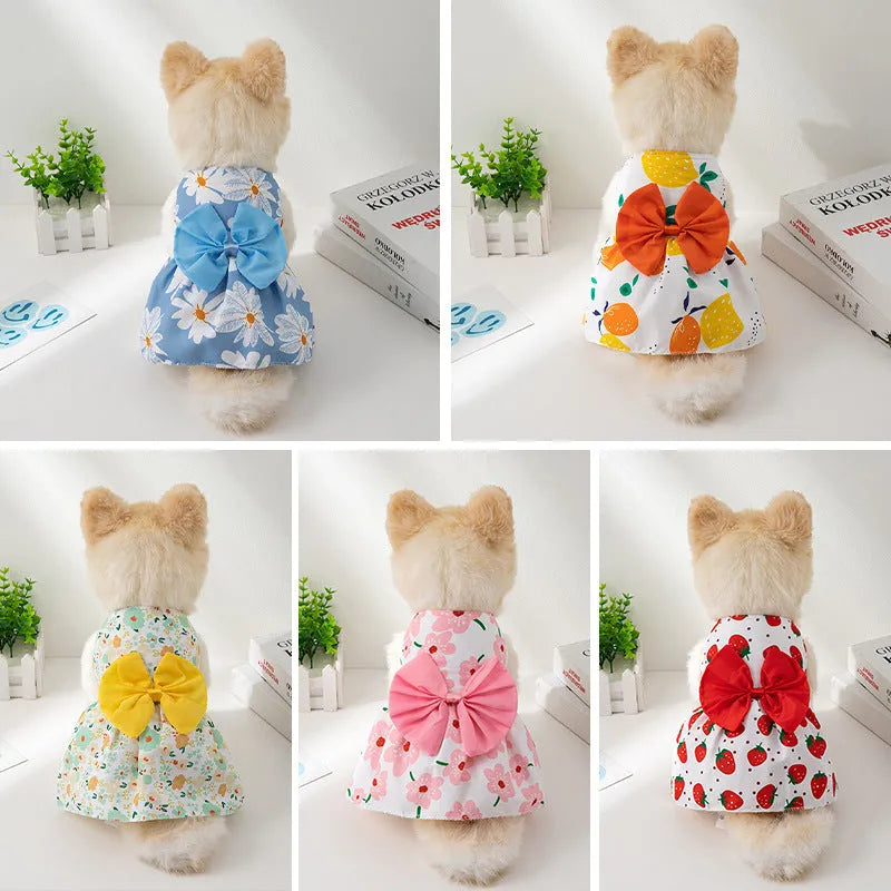 Ultra-thin floral butterfly knot princess dress for dog or cat on a hanger, showing bow colour options.