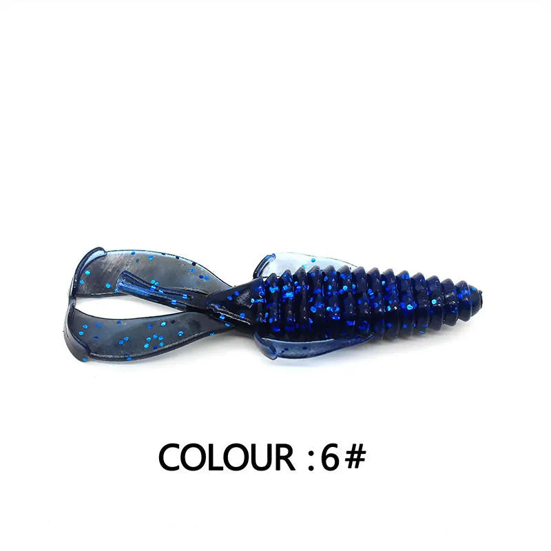 8cm PVC fishing soft bait lure in multiple colour variations against fishing tackle background