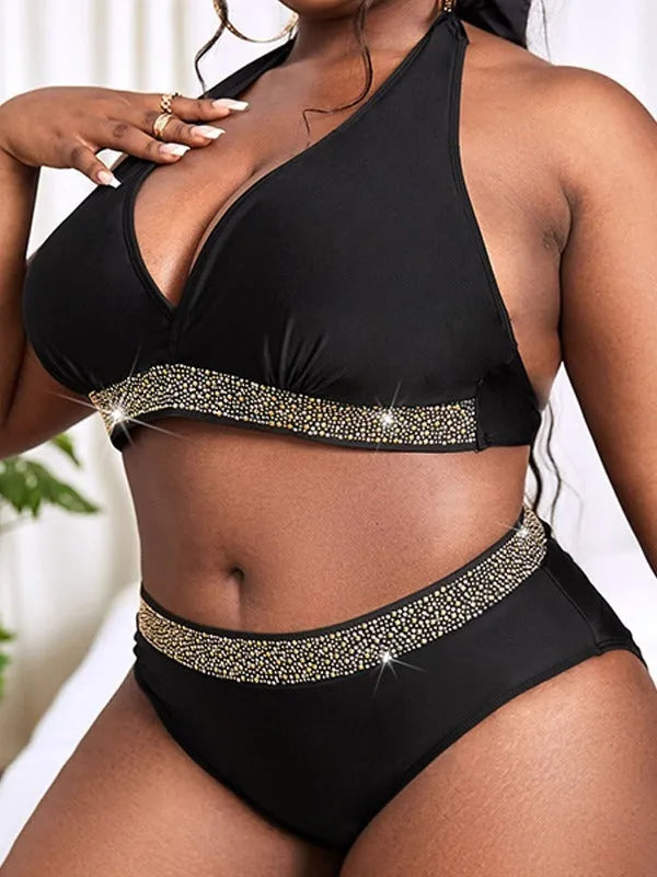 Black plus size women's bikini swimsuit with sleeveless bra and shorts on a mannequin.