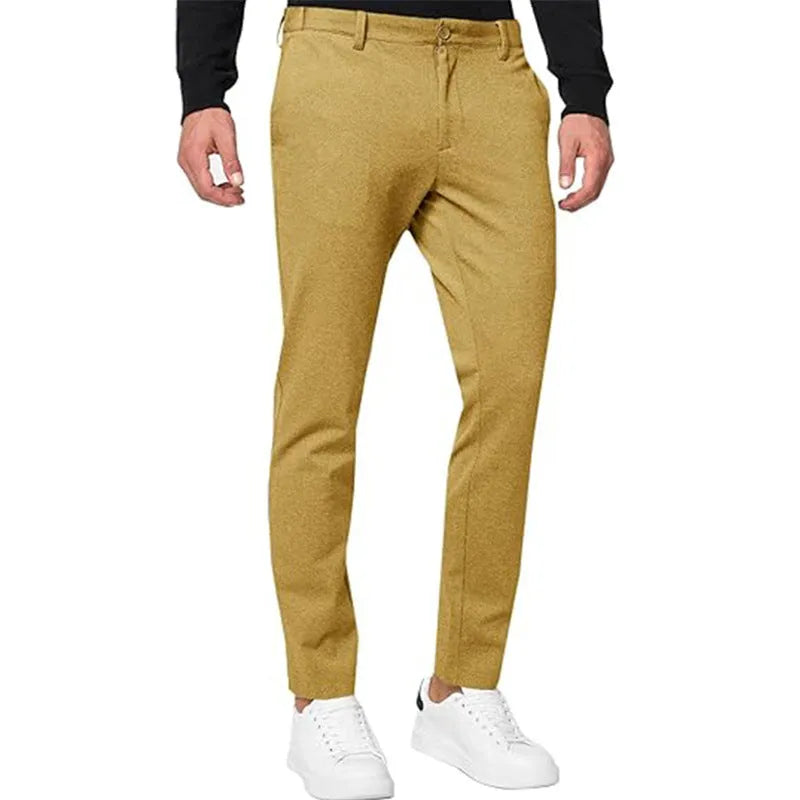 Men's slim-fit tapered chino pants in Army Green colour, showing pleated front and zipper fly detail.