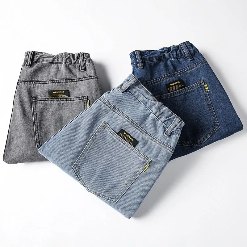 Men's loose straight casual jeans in dark blue with mid-waist fit and zipper fly