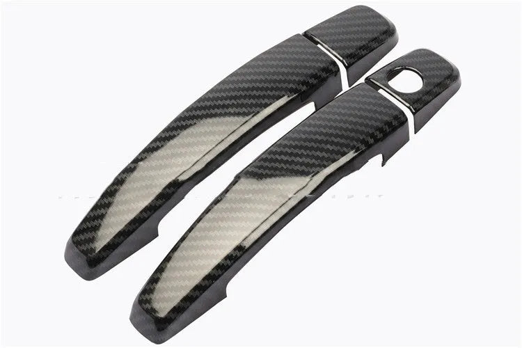 Carbon fibre pattern door handle cover for Opel Vauxhall Astra vehicles