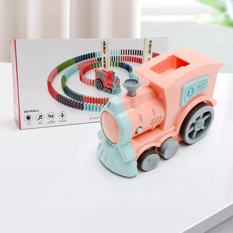 Domino train toy with 100 plastic dominoes in random colours, including toy train and card storage box