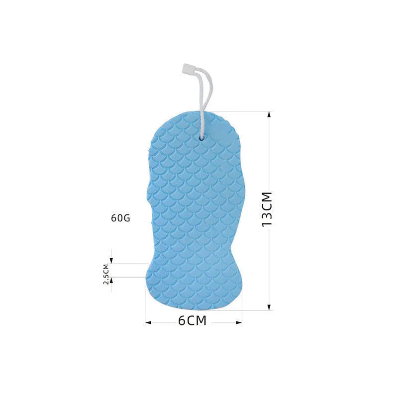 White 3D fish scale pattern bath sponge ball for gentle exfoliation in the shower.