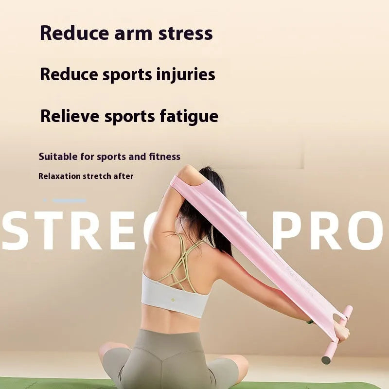 Grey and pink yoga multi-function stretching tool for shoulders, back, and hips on a plain background.