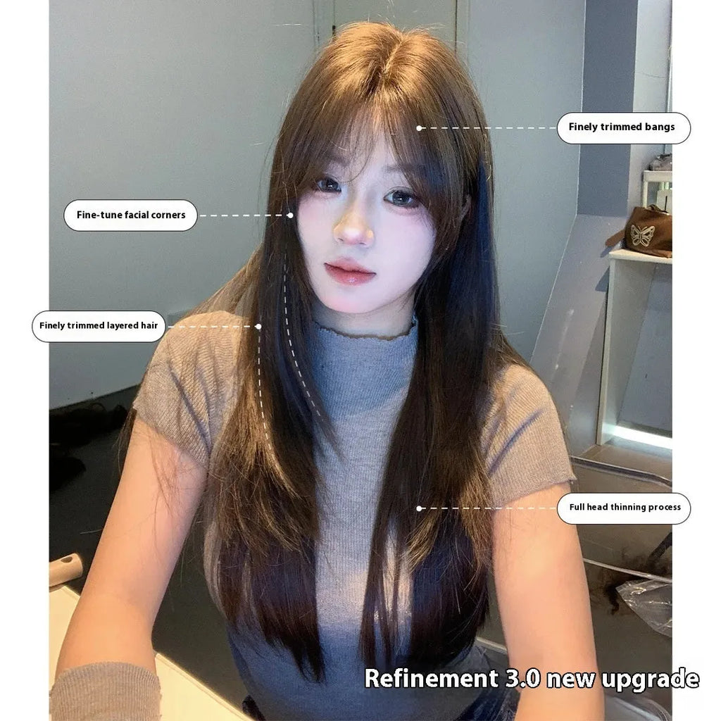 Cold brown layered long straight synthetic wig on a stand