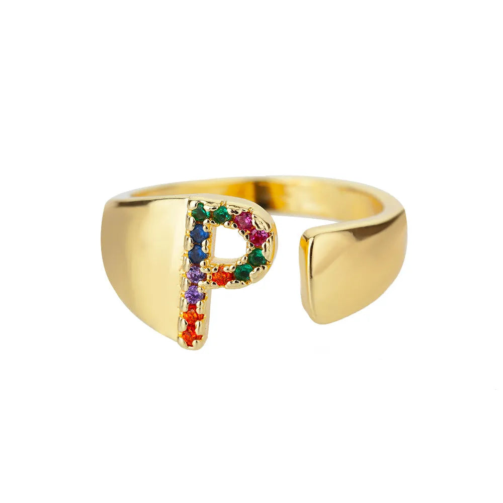 Fashion micro-set colored zirconium adjustable open ring showing letter A on a copper electroplated base