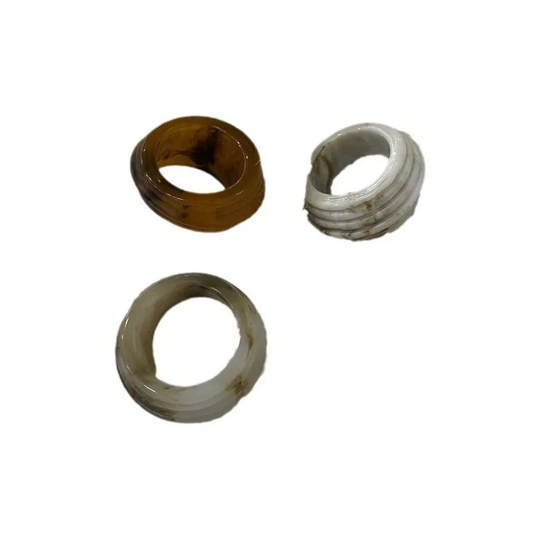 Chinese style geometric resin ring with irregular wide band design in brown and white colour options