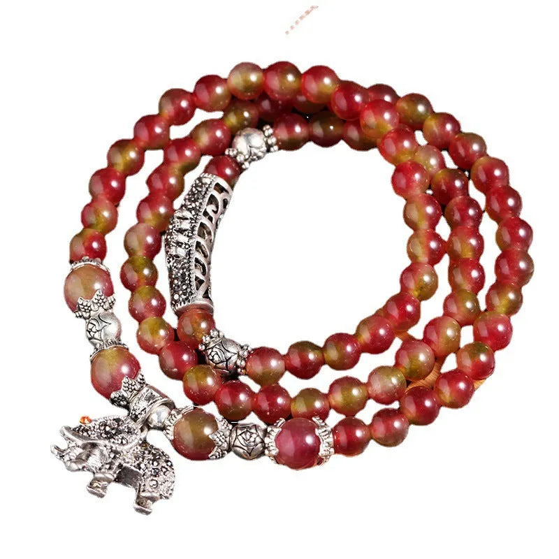 Watermelon crystal bracelet with Chinese knot design in 6mm or 8mm elephant style beads