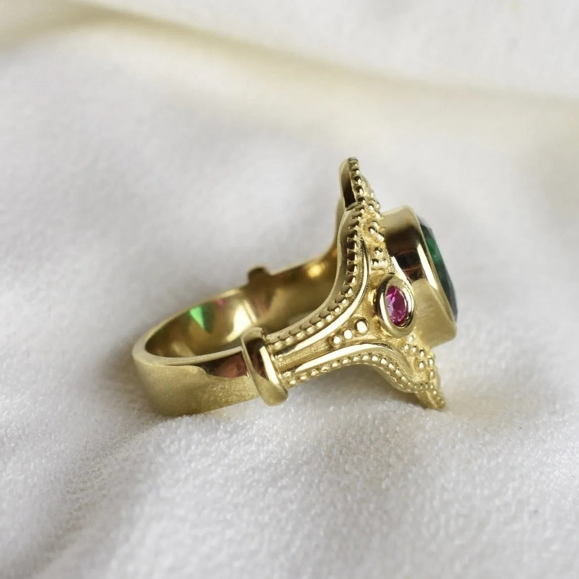 Gold-plated geometric ins style women's ring in golden lvzuan colour on a white background.