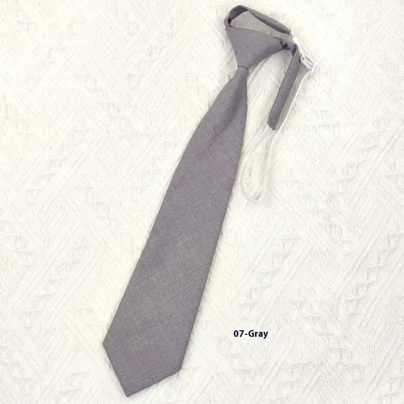Men's navy blue cotton bow tie with arrow-type styling showing traditional bow tie shape and dimensions