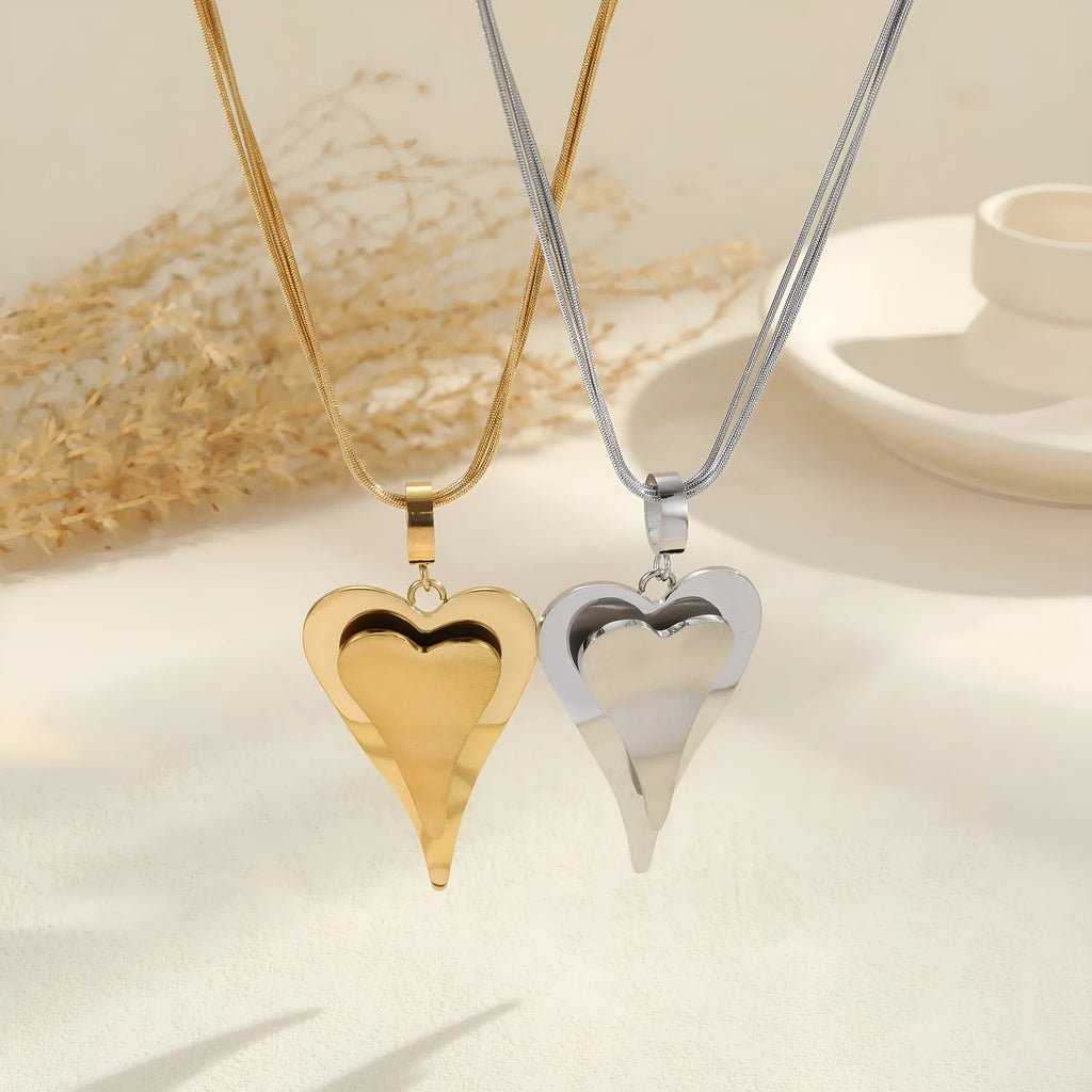 Women's stainless steel double heart snake bones chain necklace with geometric pendant