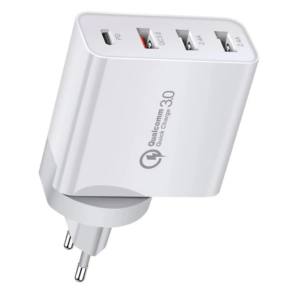 White multi-port USB fast charger with UK plug showing PD and QC ports on a table.