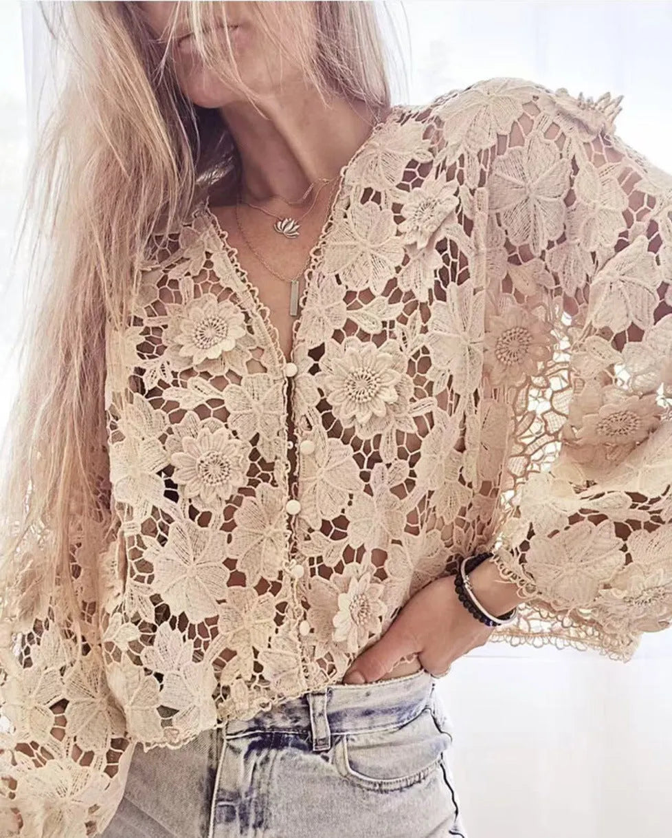 Women's black V-neck lace cardigan blouse with hollow long sleeves and three-dimensional decoration.