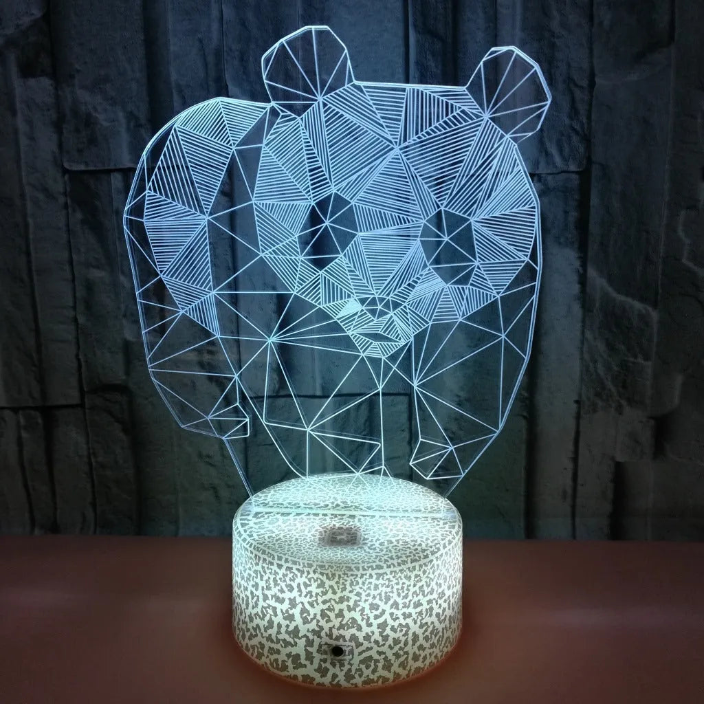 Panda colorful LED 3D night light with remote control showing seven colour gradient on a bedroom shelf