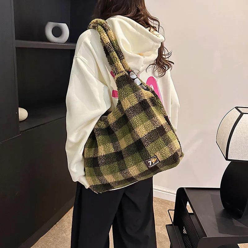 Women's soft plush plaid crossbody tote bag in army green, showing horizontal square shape and shoulder strap