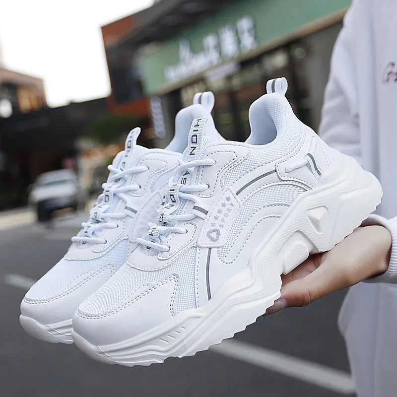 White women's casual mesh sports shoes with a buckle and round toe on a thick PU sole.