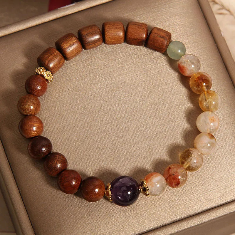 Yellow crystal amethyst bracelet with pearl and rhinestone decorative elements