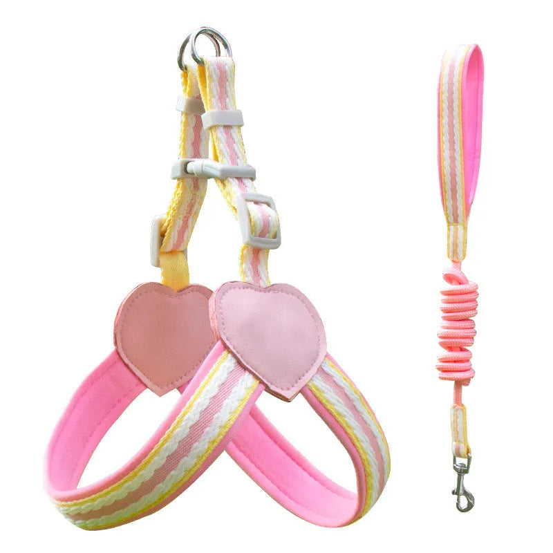 Nylon dog walking chest strap vest with an attached hand holding rope, shown in emerald green.