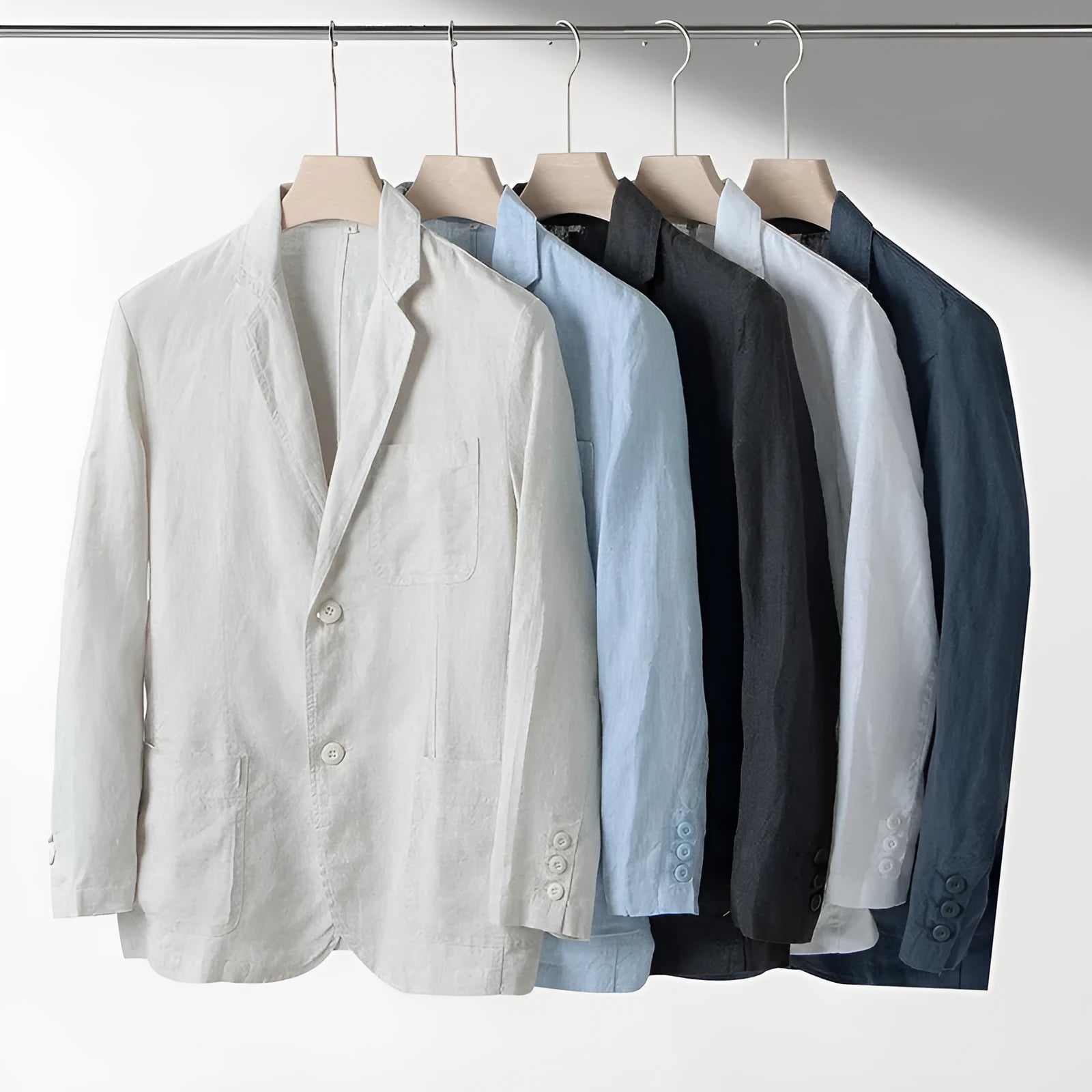 Men's loose fit linen casual blazer jacket on a hanger, shown in a solid colour.