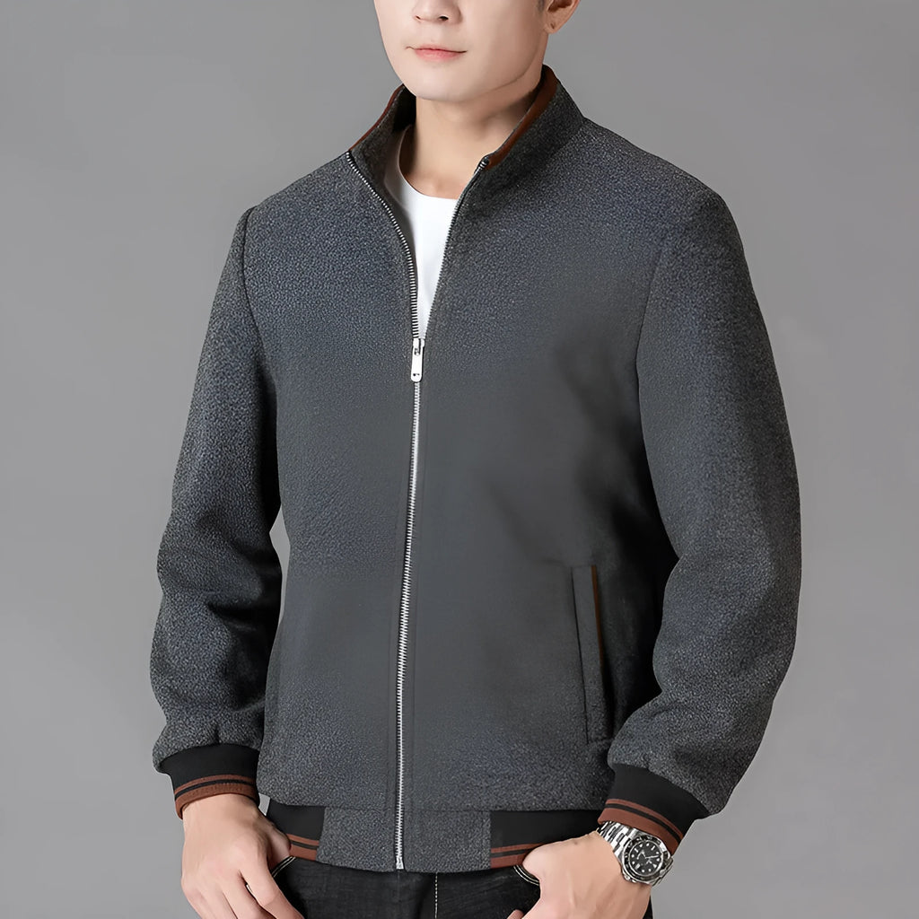 Men's grey sports-style fleece jacket with long sleeves and side pockets on a hanger.
